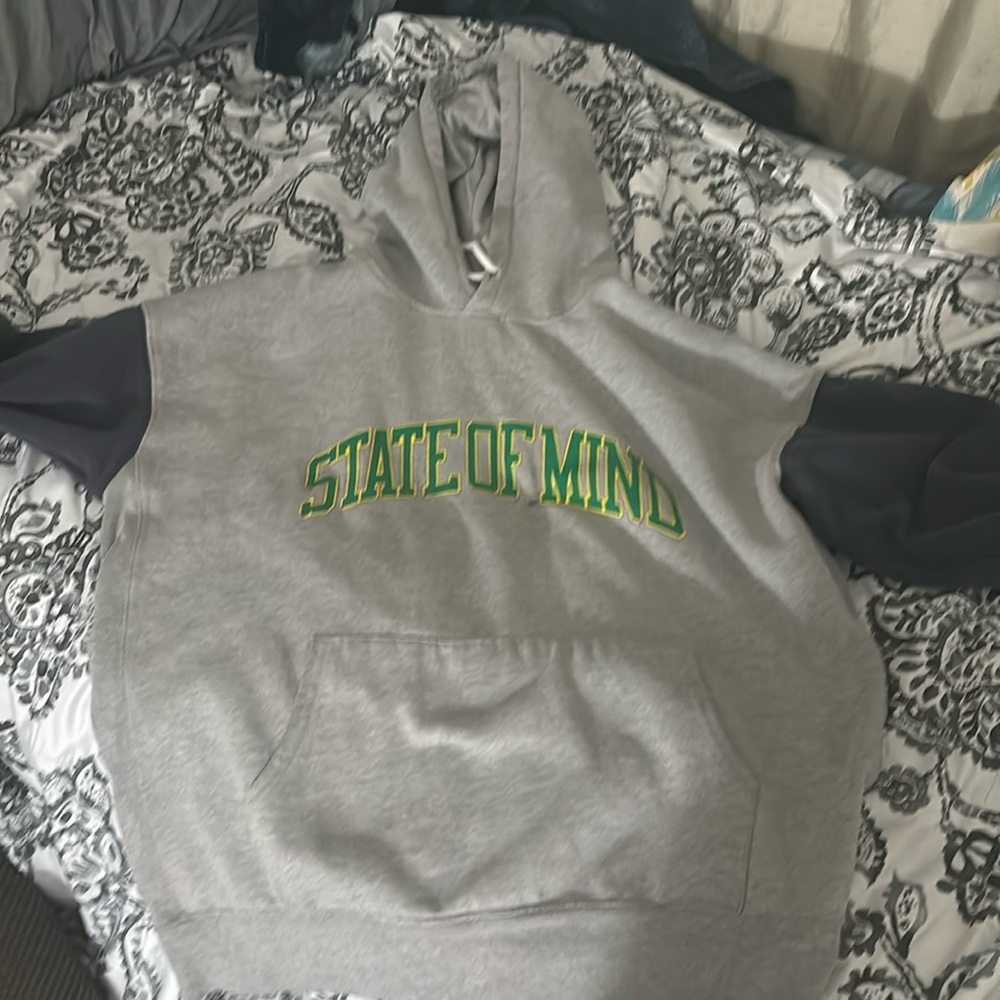 Selling a grey and blue sweater for cheap